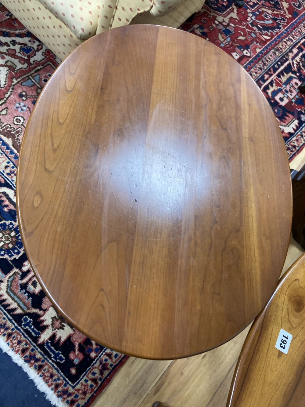 A pair of Leopold Stickley cherrywood side tables, width 65cm depth 49cm height 58cm